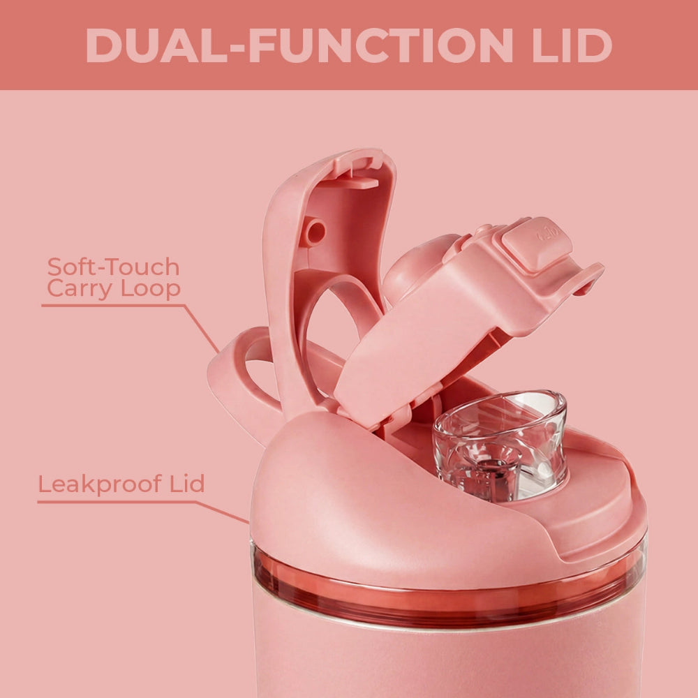 Pink dual-function lid with soft-touch carry loop and leakproof lid on a pink background.