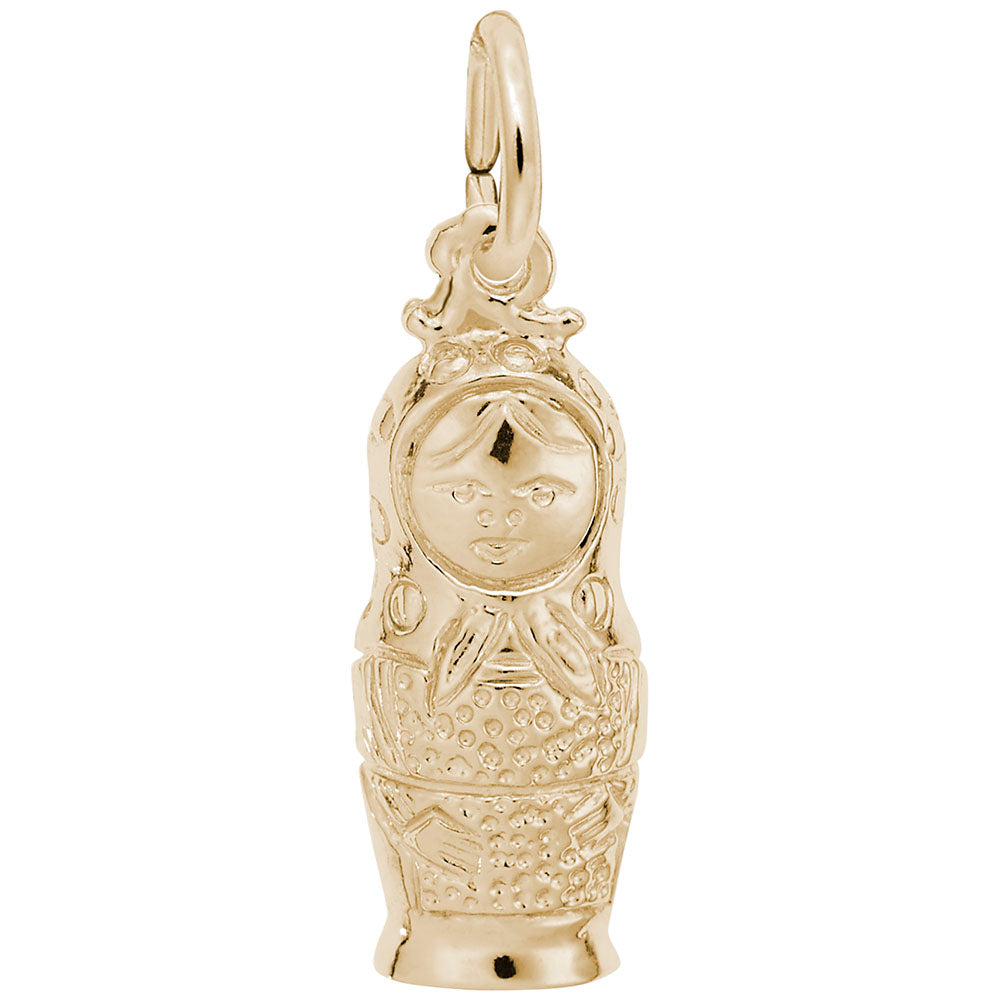 Gold charm shaped like a Russian nesting doll on a white background