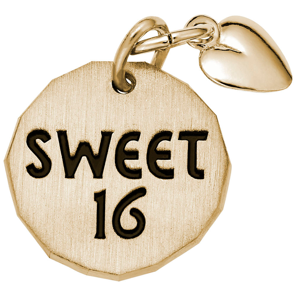 Gold disc charm with 'SWEET 16' text and a heart dangle on a white background