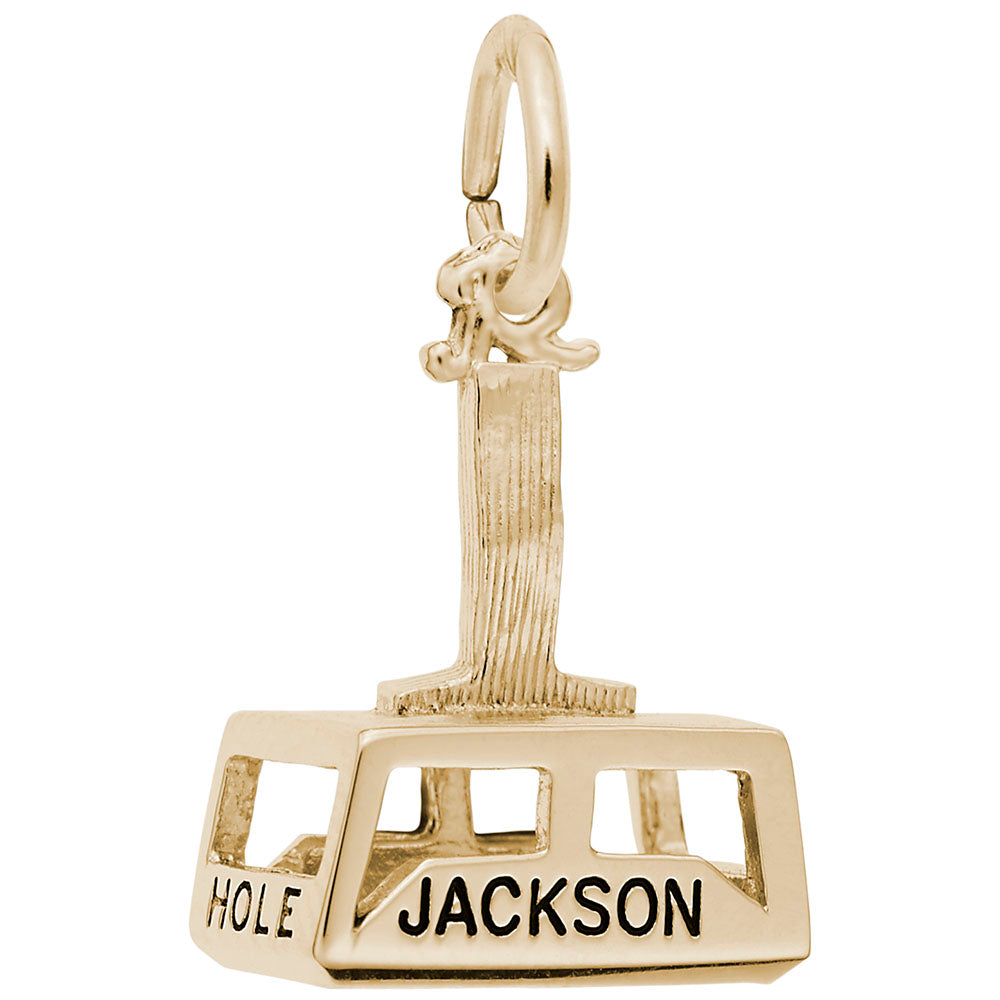 Gold gondola charm engraved with 'JACKSON HOLE' on a white background