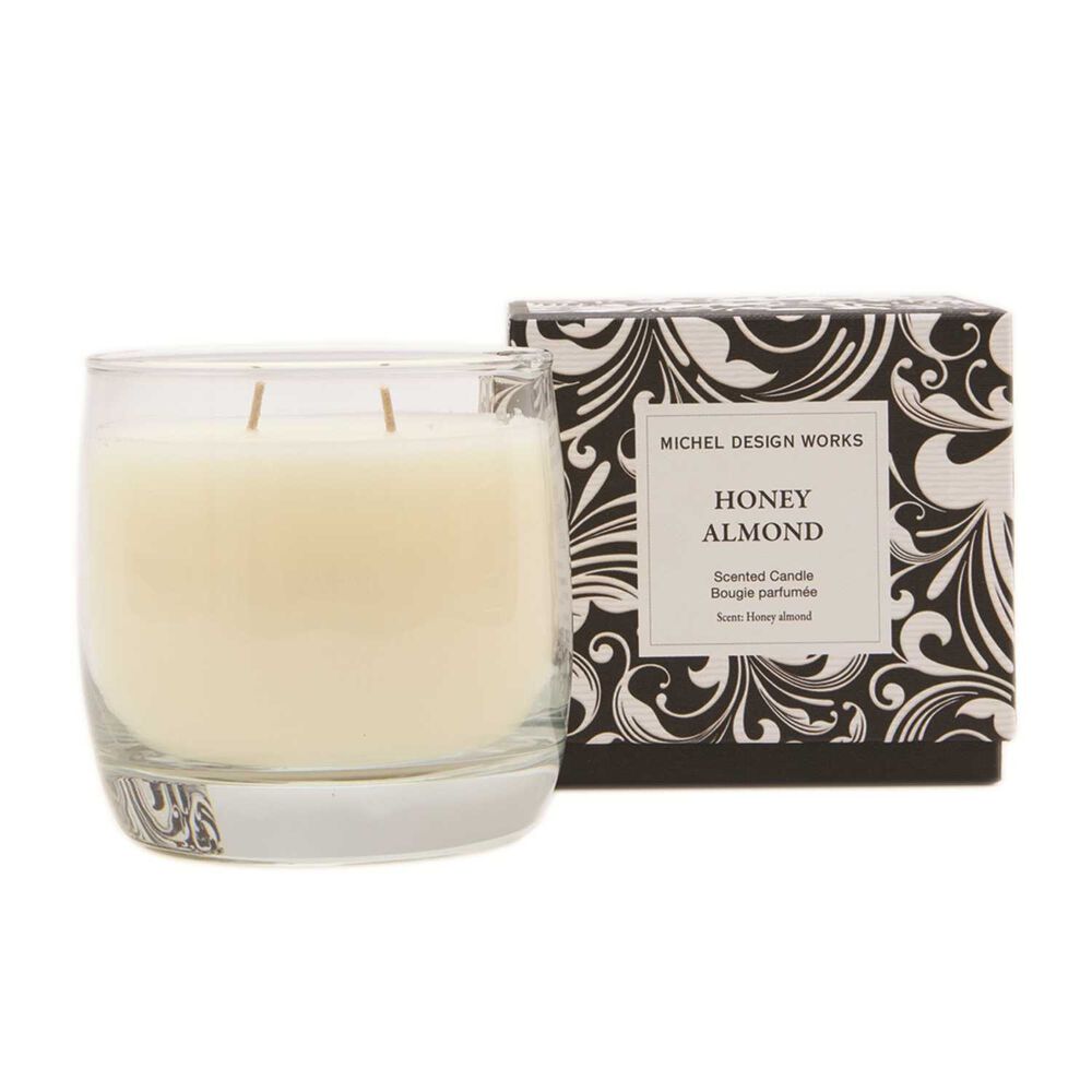 Honey Almond candle by Michel Design Works with packaging on a white background