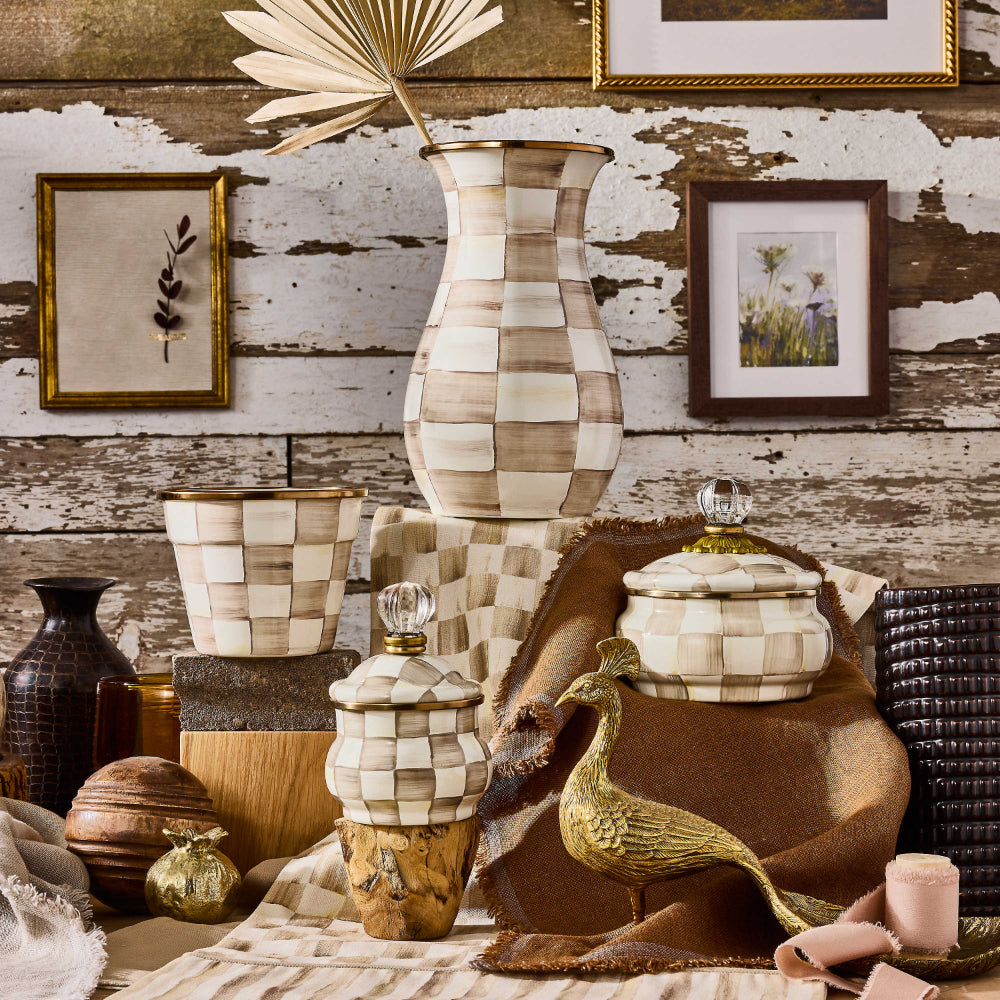 A display of mocha check decor pieces in a home display.