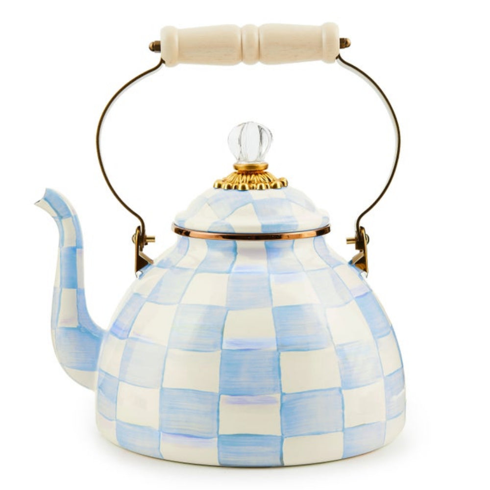 Decorative tea kettle with checkered pattern on a white background