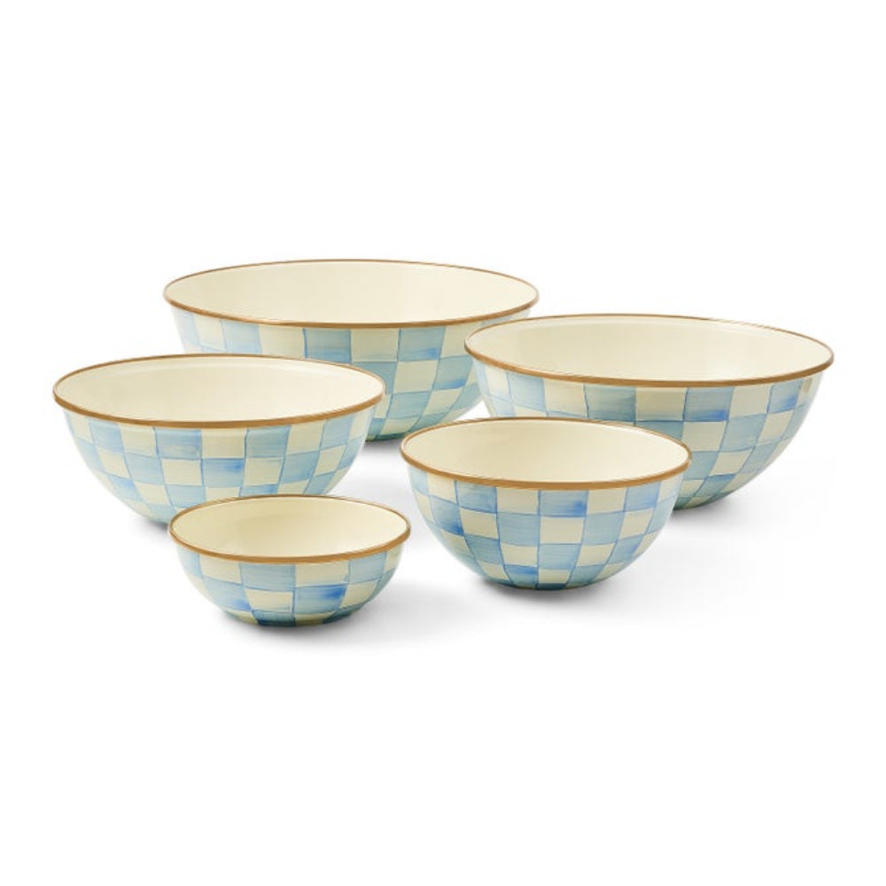 Set of five ceramic bowls with blue and white checkered pattern on a white background