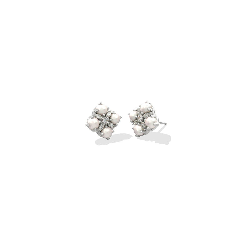 A pair of silver stud earrings featuring a cluster of small white pearls surrounded by clear crystals, set against a plain white background.