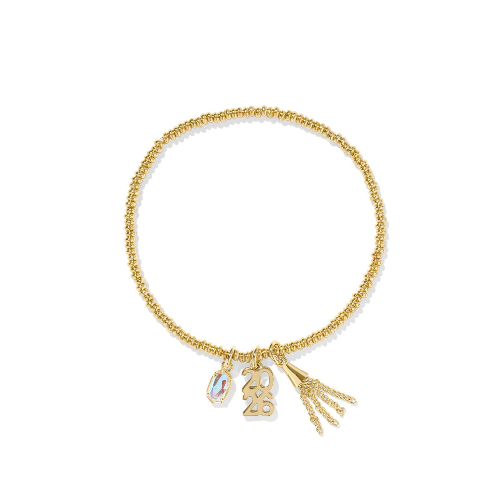 Gold bracelet with charms on a white background