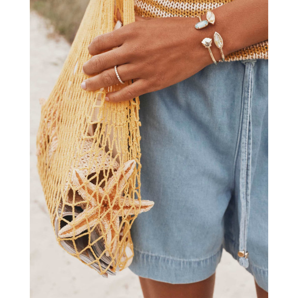 model wearing cuff bracelets