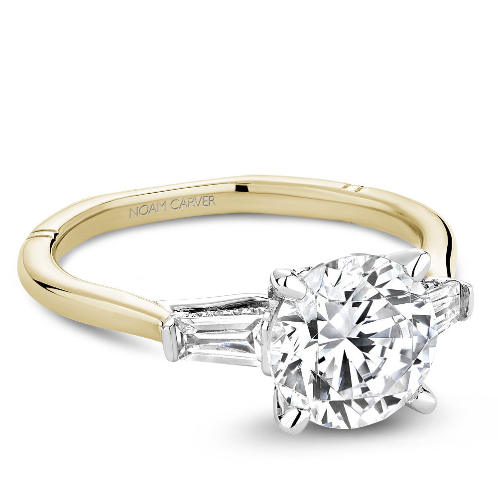 Two-tone gold diamond ring with 'Noam Carver' branding on a white background