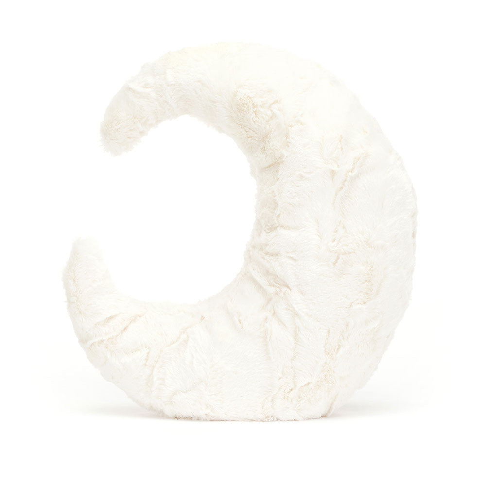 A photo of the back of a white plush crescent moon with a smiling face and grey leggs on a white background.