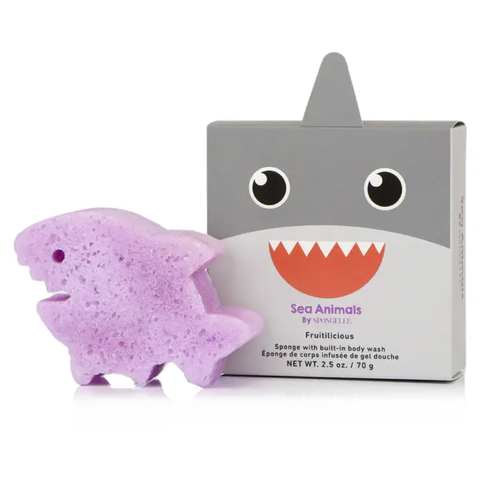 Purple shark-shaped sponge with a shark-themed packaging box on a white background