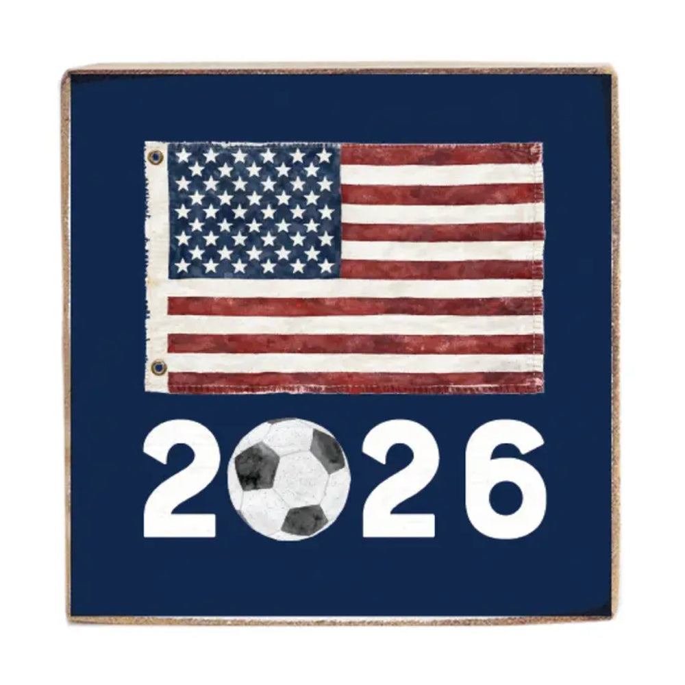 American flag on a blue background with '2026' and a soccer ball.