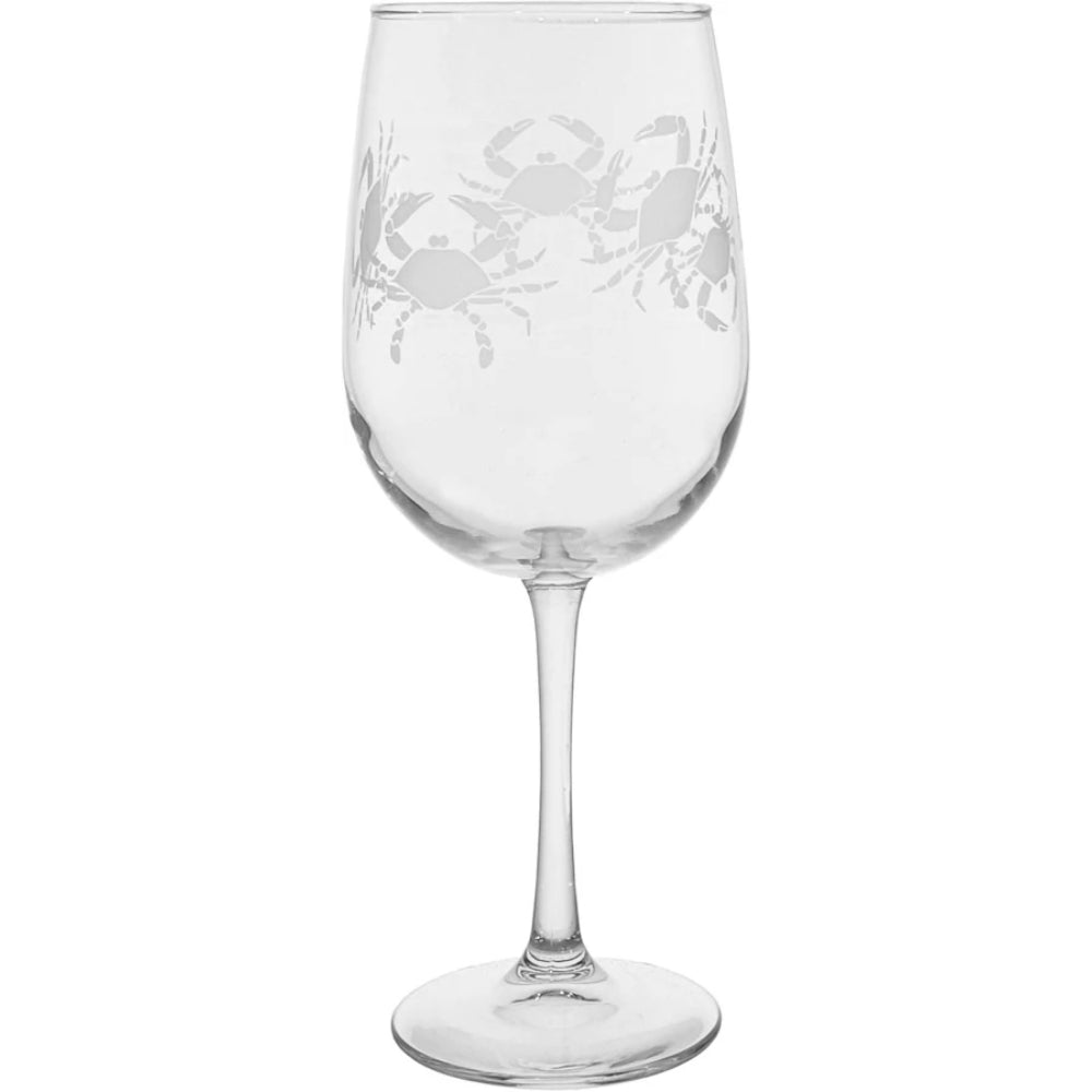 A clear wine glass with an etched crab design on the bowl, shown against a plain white background.
