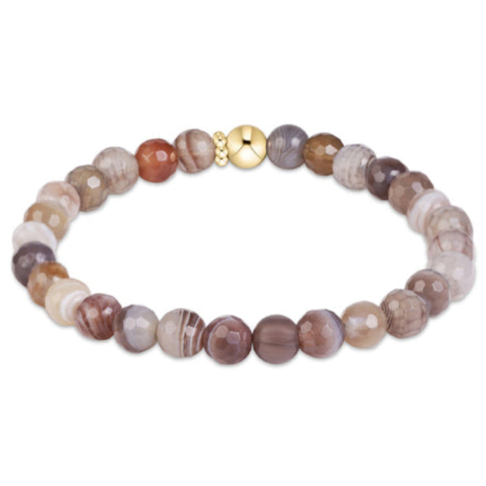 A beaded stretch bracelet made of faceted round agate-like beads in earthy brown, beige, and gray tones, with a small gold-toned clasp at the top, shown on a plain white background.