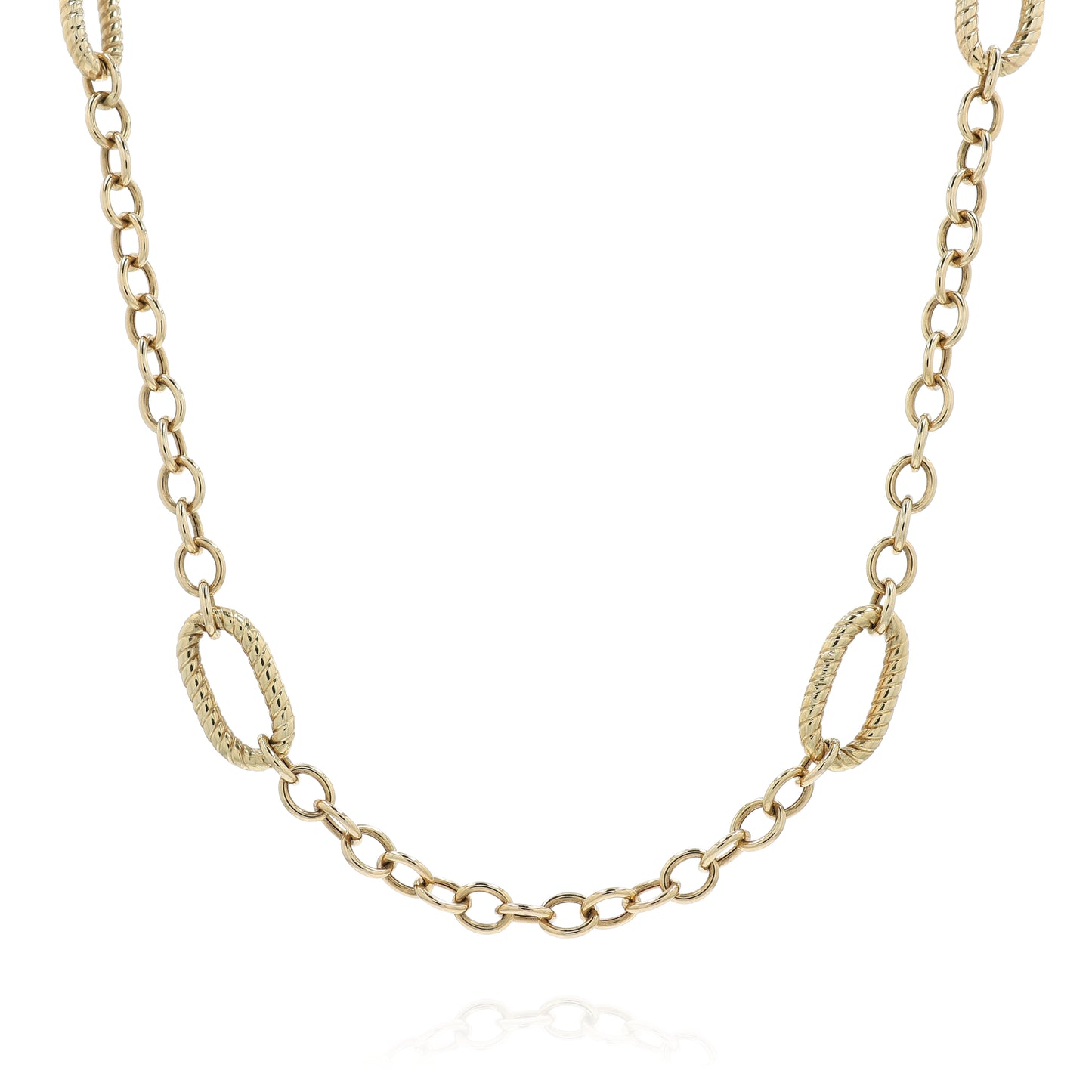 Yellow gold polished and twisted link chain necklace on a white background