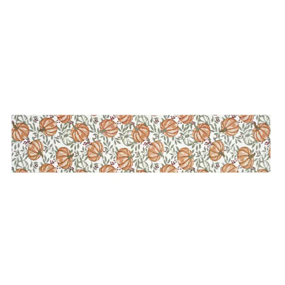 A rectangular table runner featuring a repeating pattern of orange pumpkins and green leaves on a white background.
