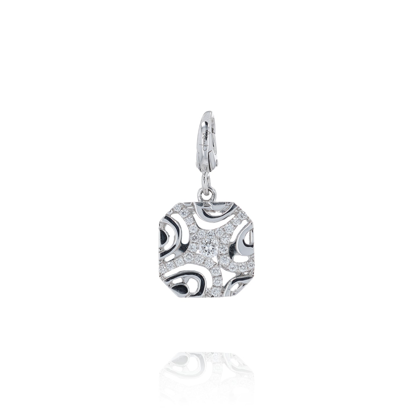 White gold filigree design cushion shaped diamond charm pendant on a white background