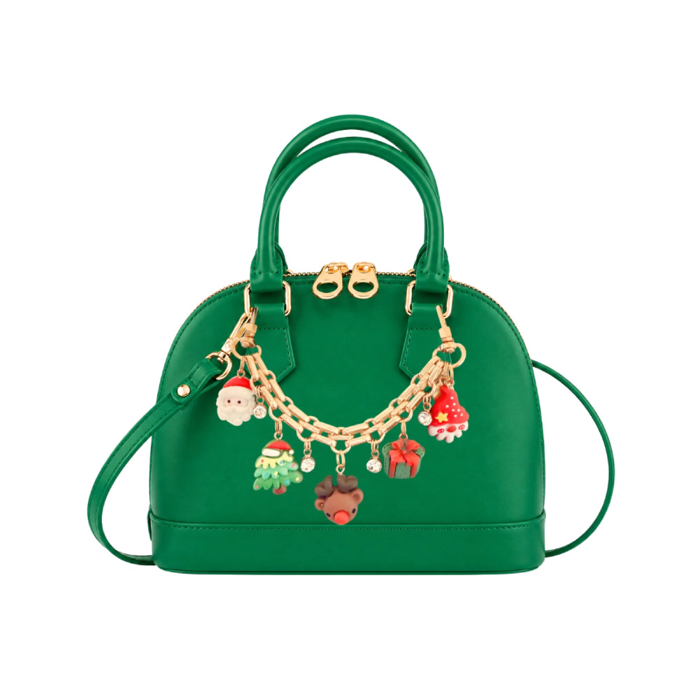 Side two of a green hand bag with holiday themed charms on a white backround.