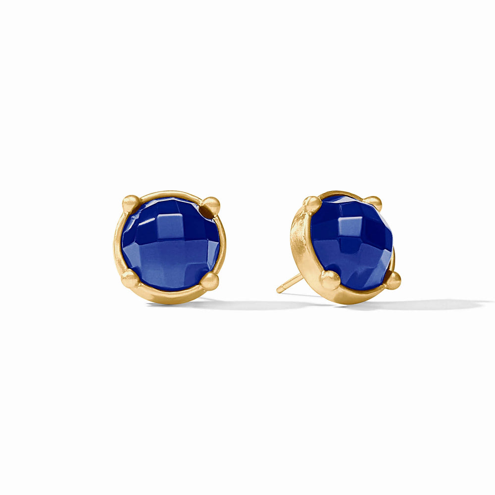 Gold earrings with blue stones on a white background