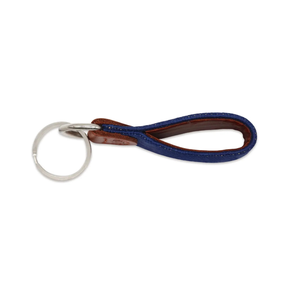 Keychain with blue and brown leather strap on a white background