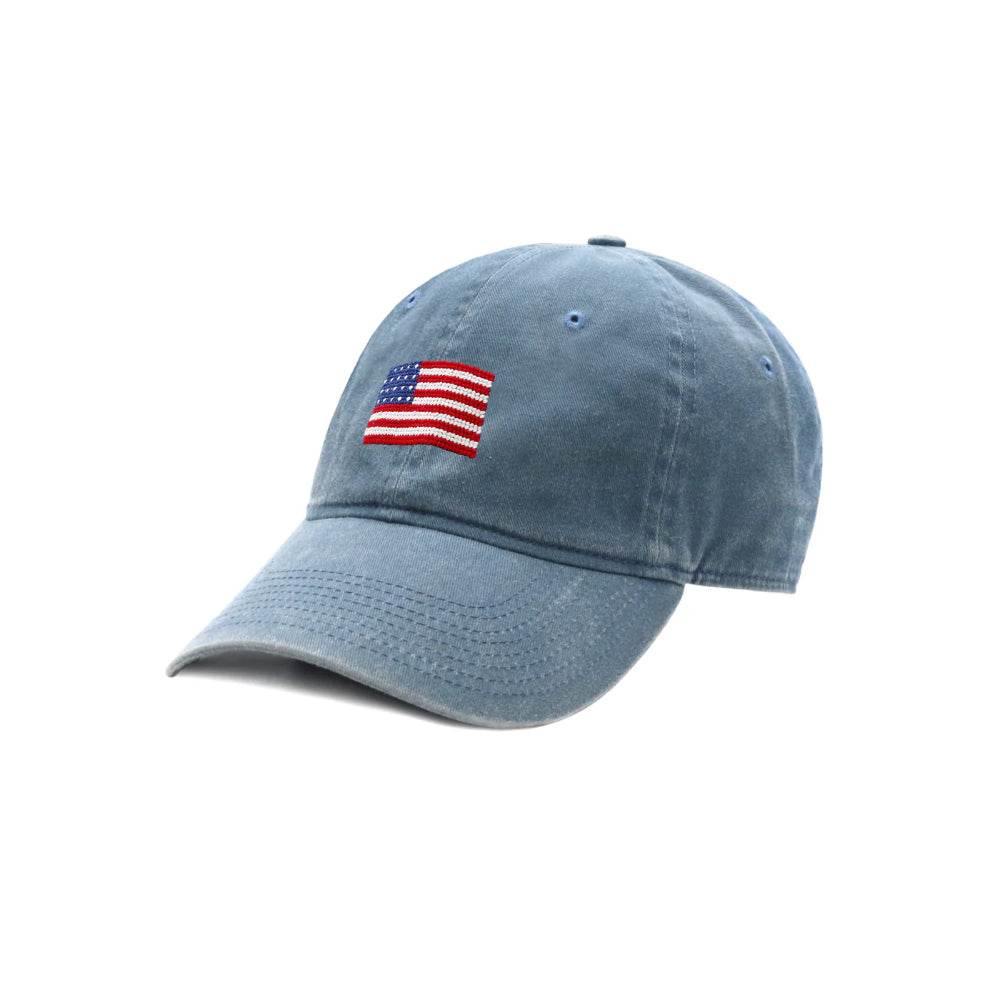 Blue cap with American flag patch on a white background