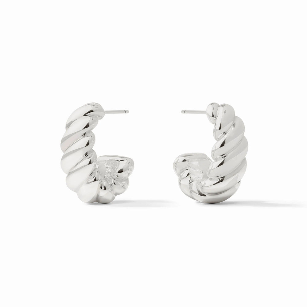 Pair of silver hoop earrings on a white background