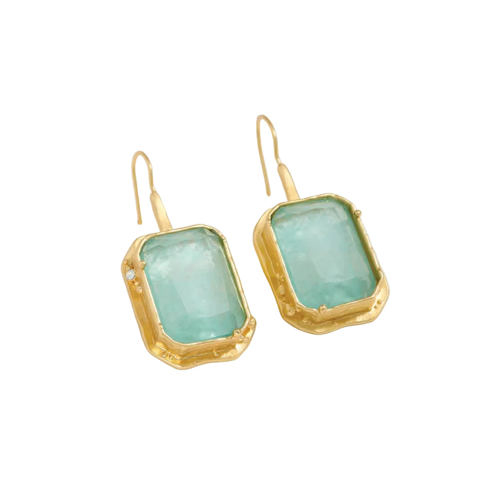 A pair of gold drop earrings featuring rectangular light aqua blue-green gemstones in a textured gold bezel setting, shown on a light white background.