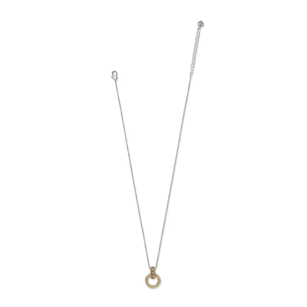 A delicate silver chain necklace with a small gold ring pendant, displayed against a solid white background.