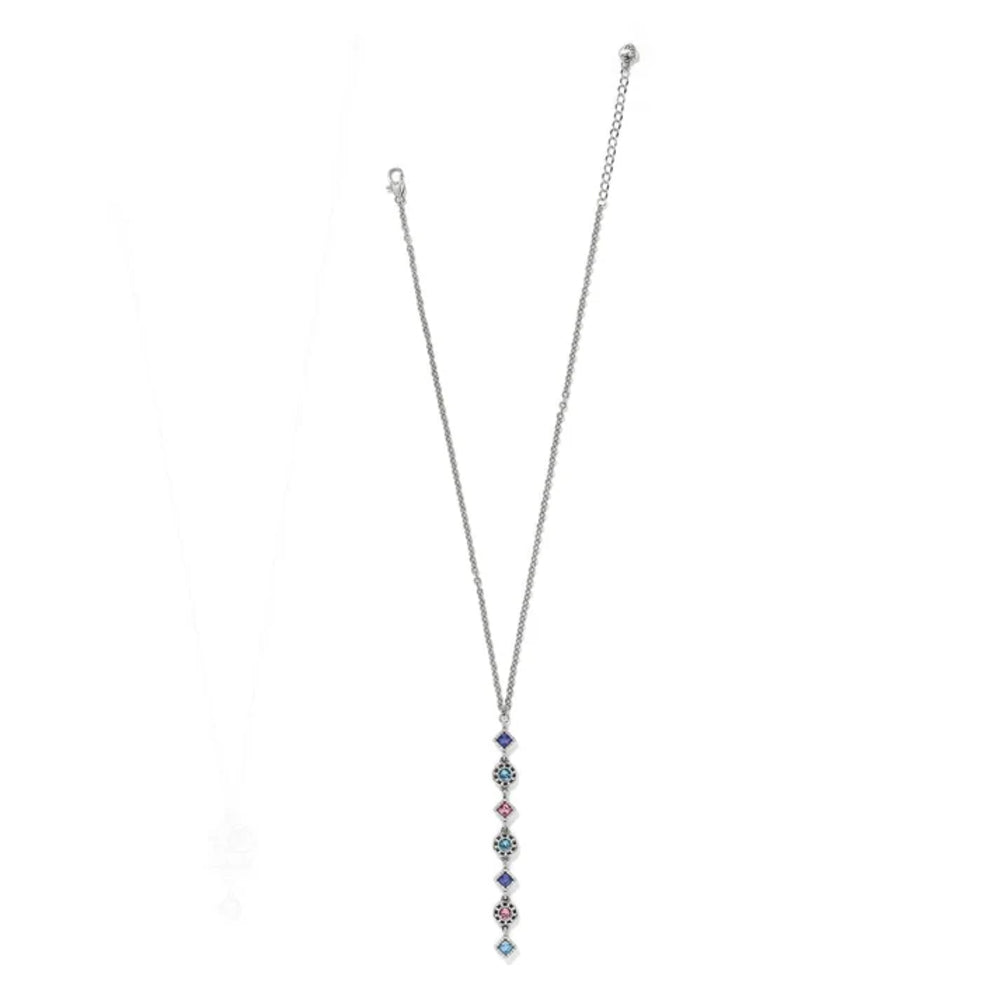 A silver-toned Y-necklace featuring a long chain and a vertical drop pendant adorned with multiple small faceted gemstones in shades of blue, pink, and clear, displayed against a solid white background.