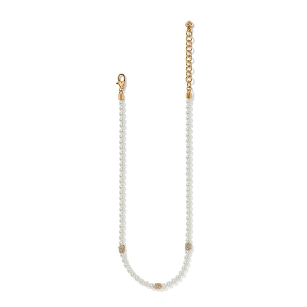 A delicate pearl necklace with small white pearls and gold-toned spacer beads, featuring a lobster clasp and an adjustable gold chain extender, shown on a plain white background.