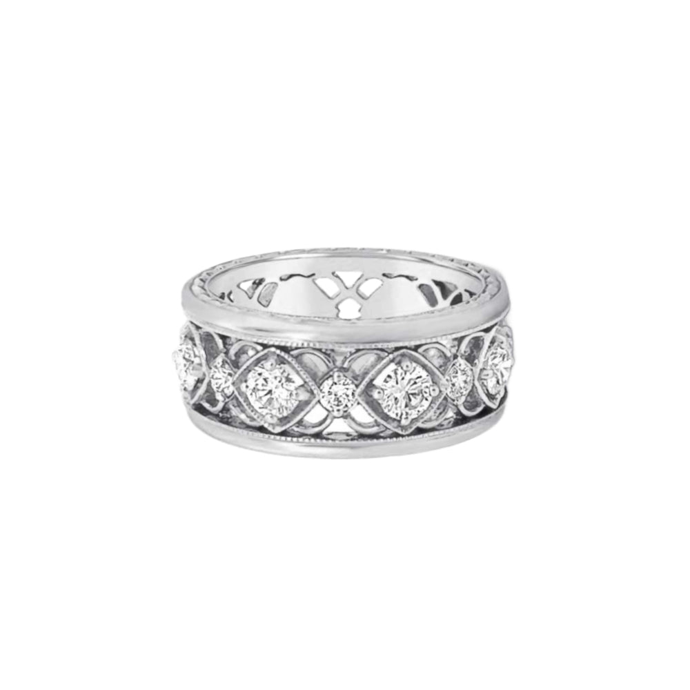 White gold open work band with diamond accents on a white background