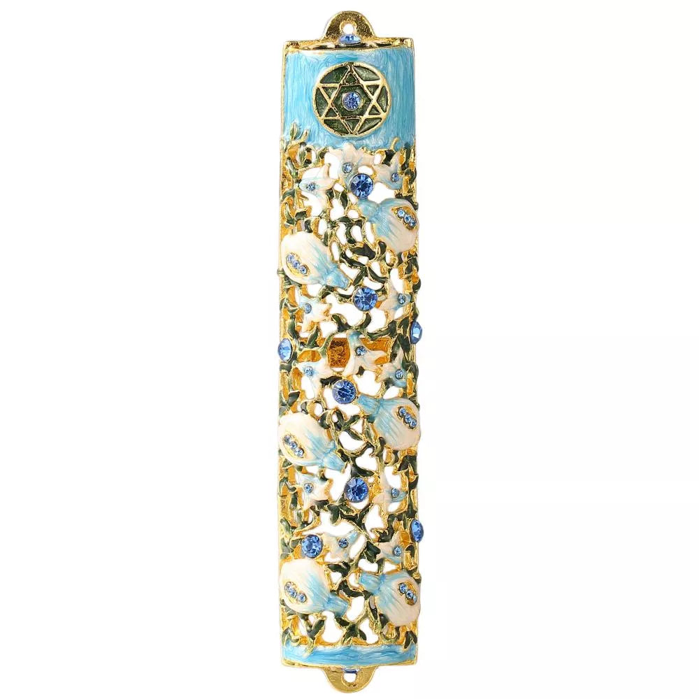 Decorative mezzuzah case with floral patterns and blue accents on a white background
