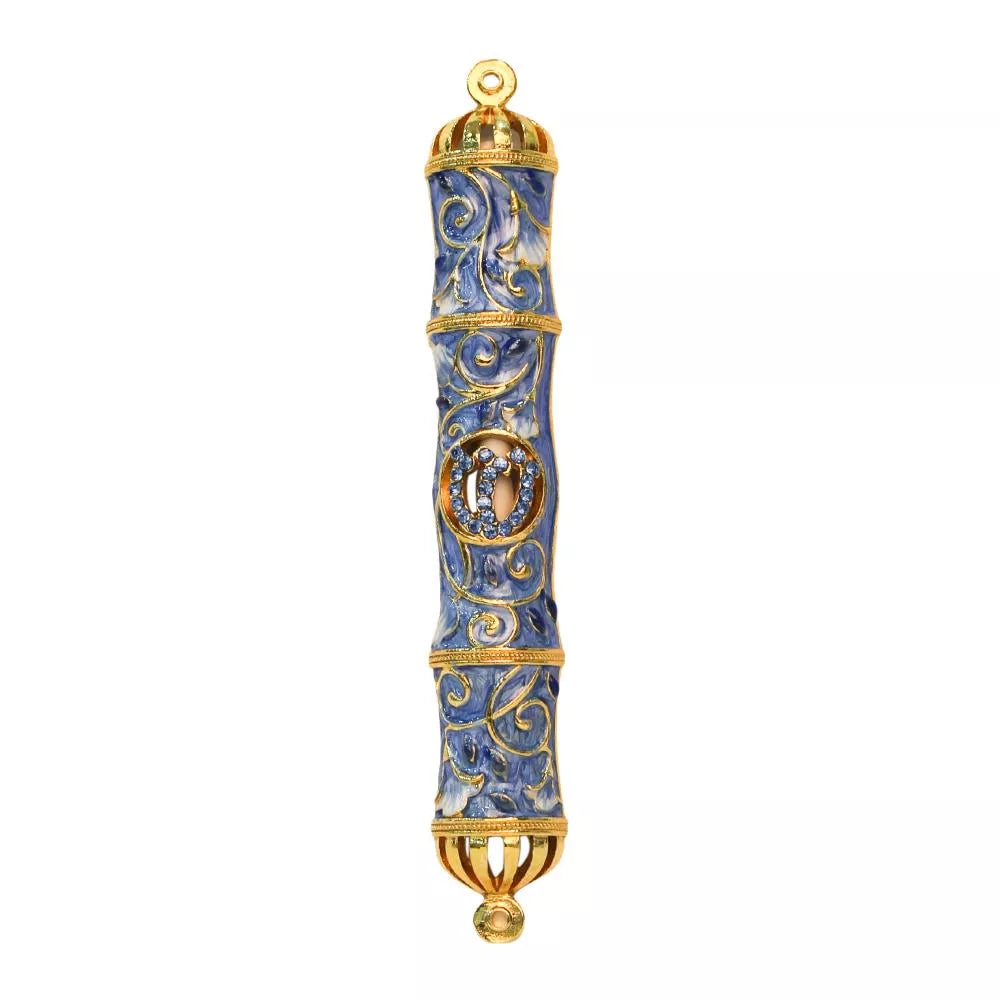 Decorative cylindrical Mezuzah with gold accents on a white background