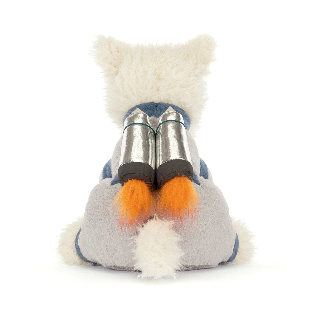 A photo of the back of a white plush dog toy with a space-themed design outfit on a white background.