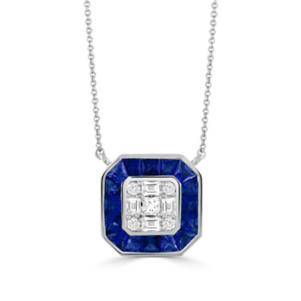 silver tone necklace with blue stones surrounding clear stones on a white background