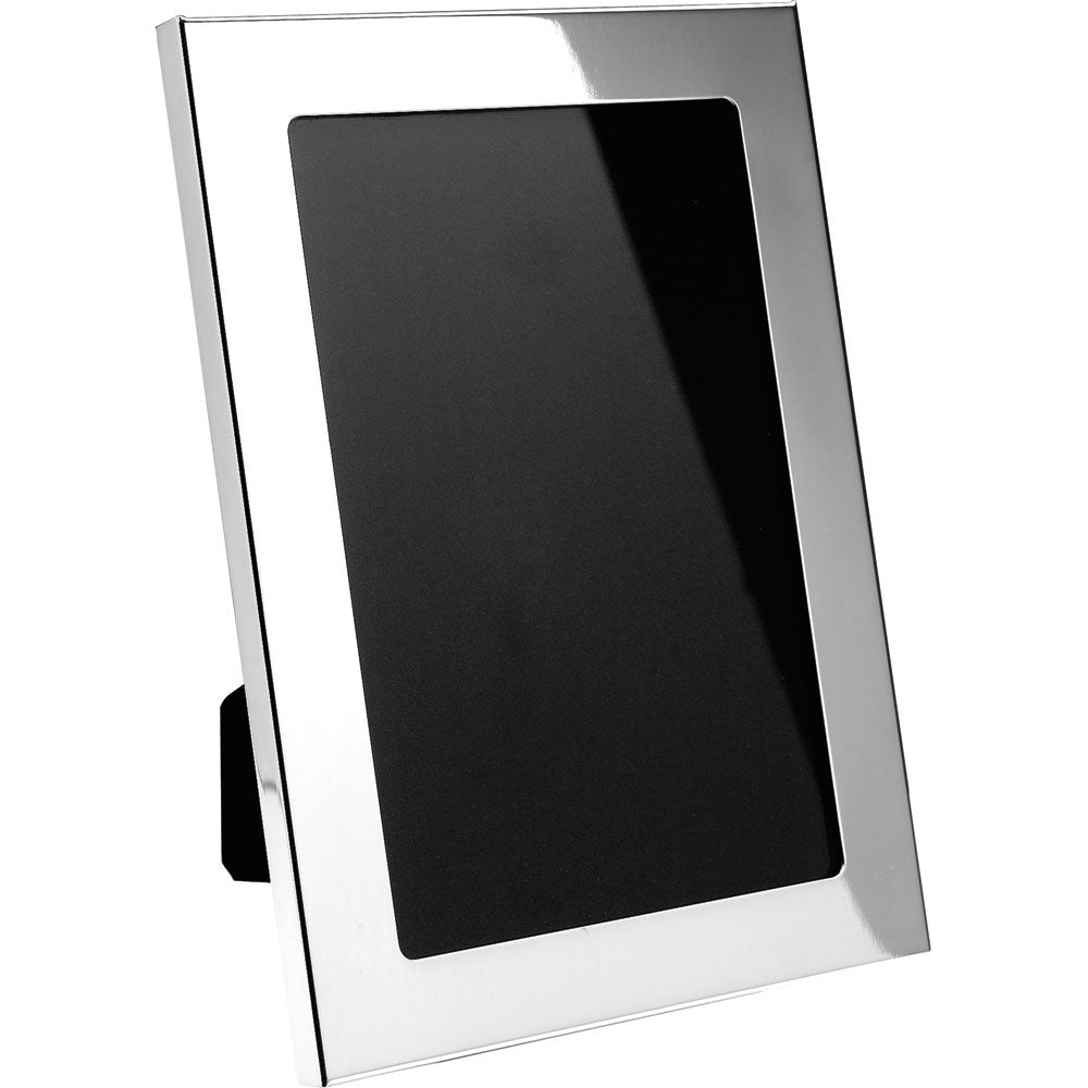 A left facing angled side photo of a silver 4x6 photo frame on a white background.
