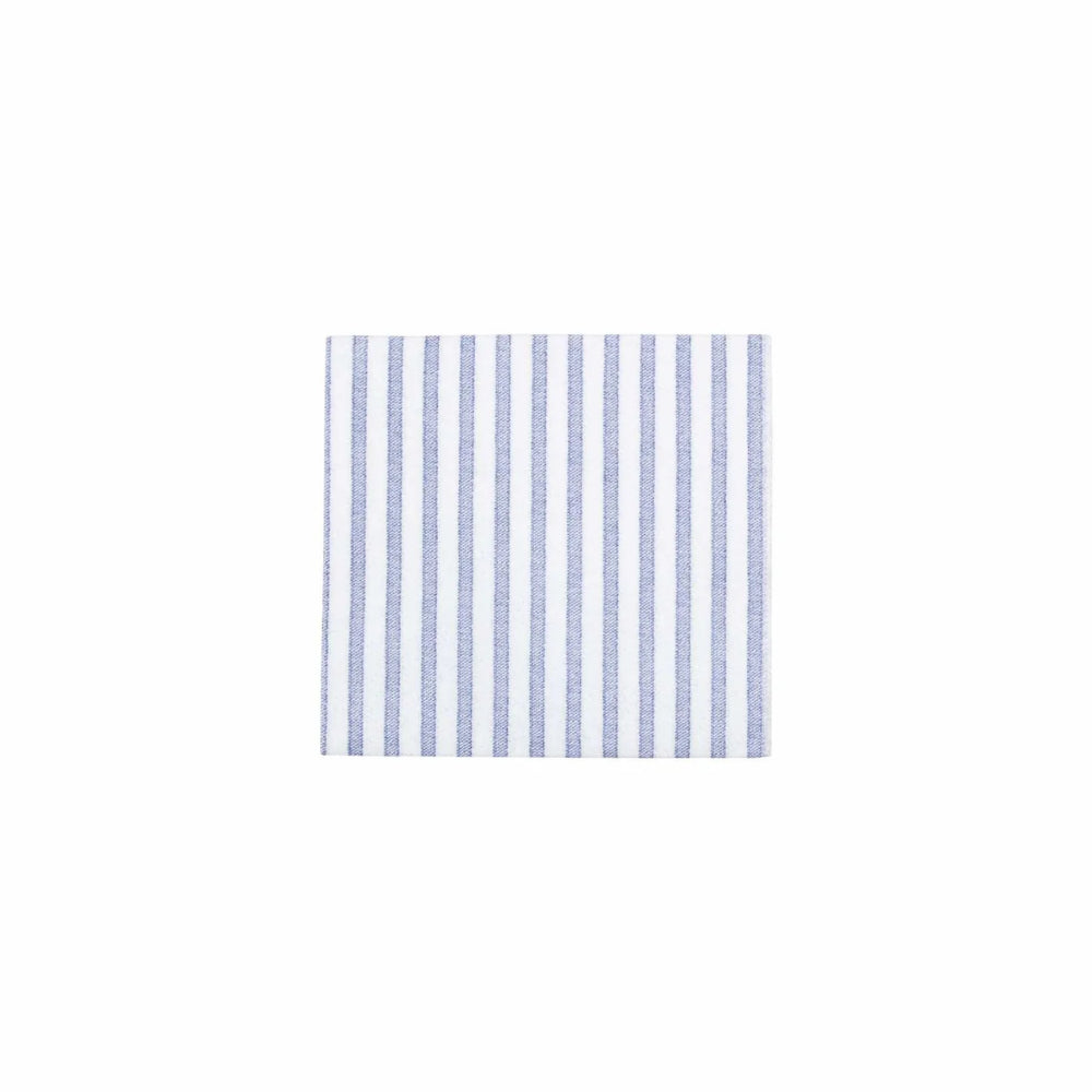 A cocktail napkin with vertical blue stripes in light blue and white, centered on a plain white background.