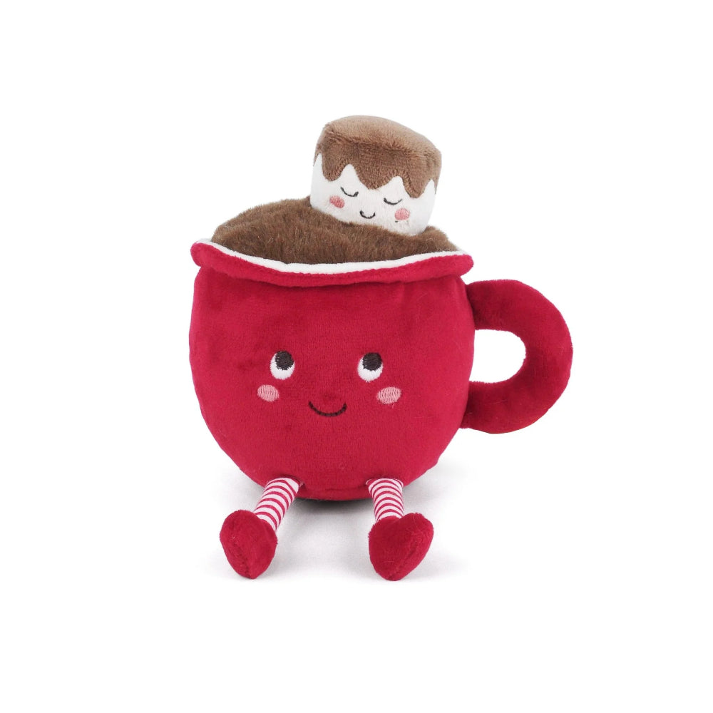 A red plush coffee mug character toy with smiling eyes and cheeks, striped legs, a brown coffee surface, and a small sleeping marshmallow character on top, photographed on a clean white background.