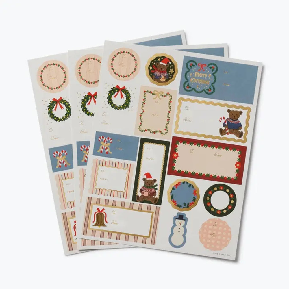 Set of Christmas-themed stationery sheets with various designs on a white background