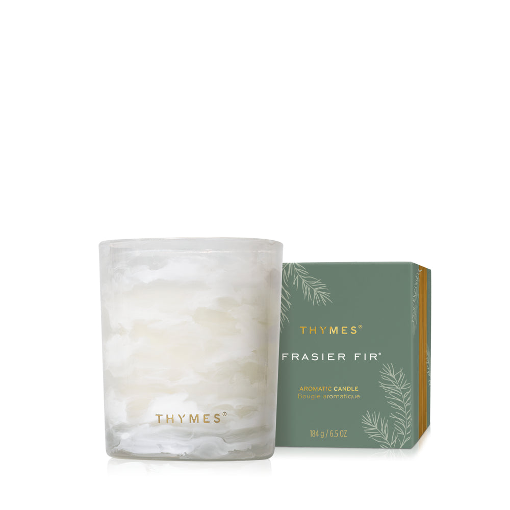 Thymes Frasier Fir candle and packaging on a white background