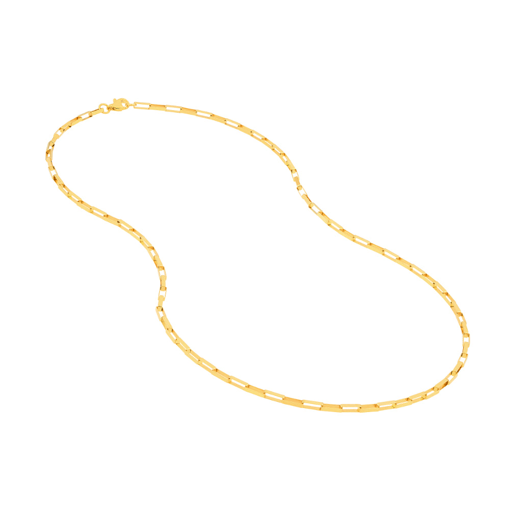gold tone long link necklace on white background