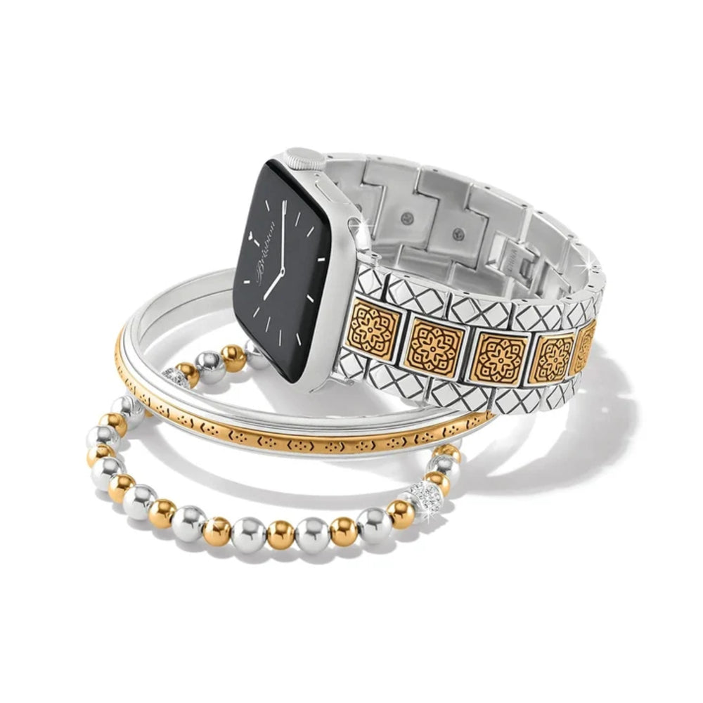 Smartwatch with decorative band and bracelets on a white background