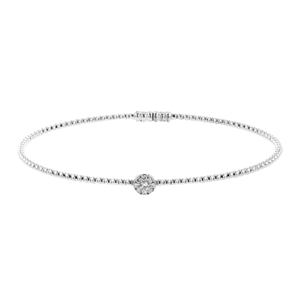 An 18k beaded bangle bracelet with diamonds, featuring white gold colors and a round diamond clasp.
