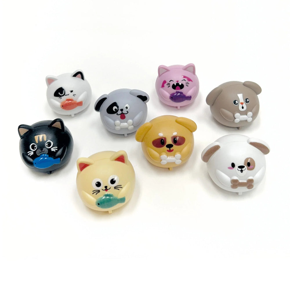 Set of colorful animal-shaped buttons on a white background.