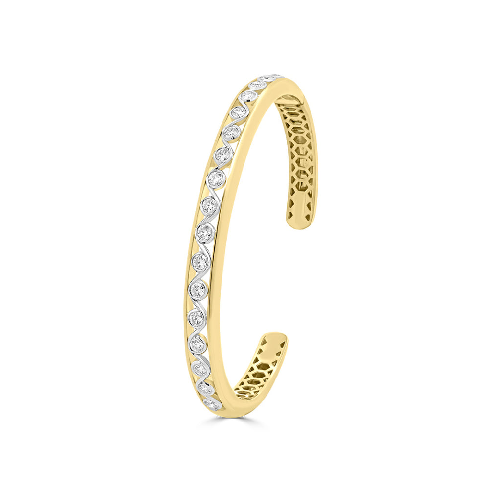 Yellow gold bracelet with diamond center row accents on a white background