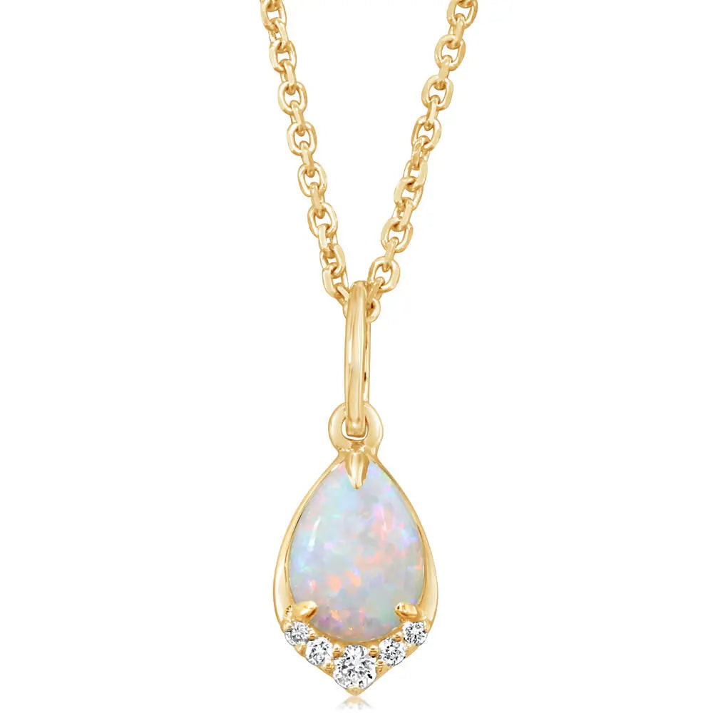 A 14k gold pendant necklace with a pear-shaped opal centerpiece and smaller diamond accents around the bottom edge, displayed against a white background.