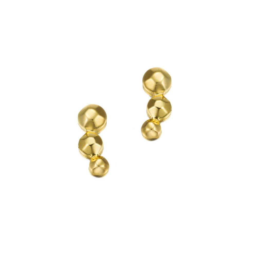 gold bead earrings on white background