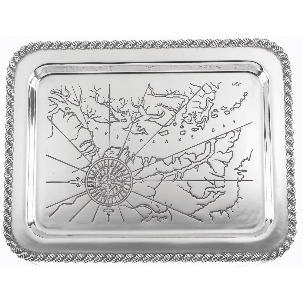 Silver tray with engraved map design on a white background