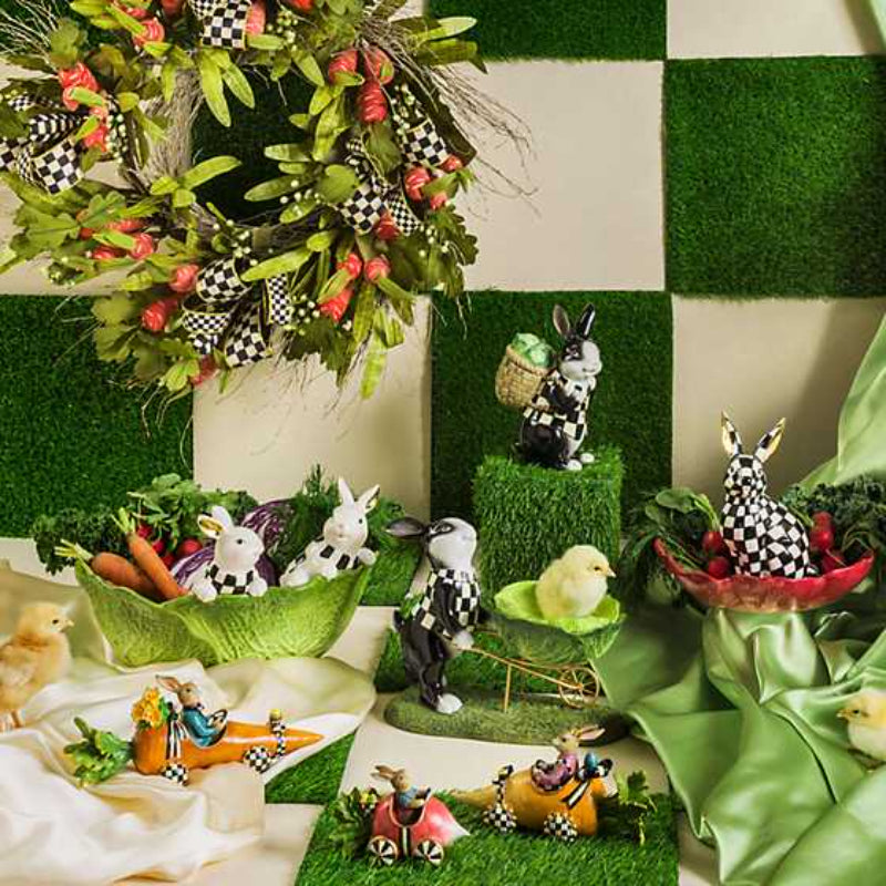 A bunch of decorative bunnies in various Mackenzie Childs styles.
