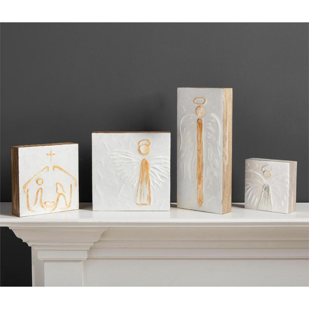 A collection of angel blocks on a display.
