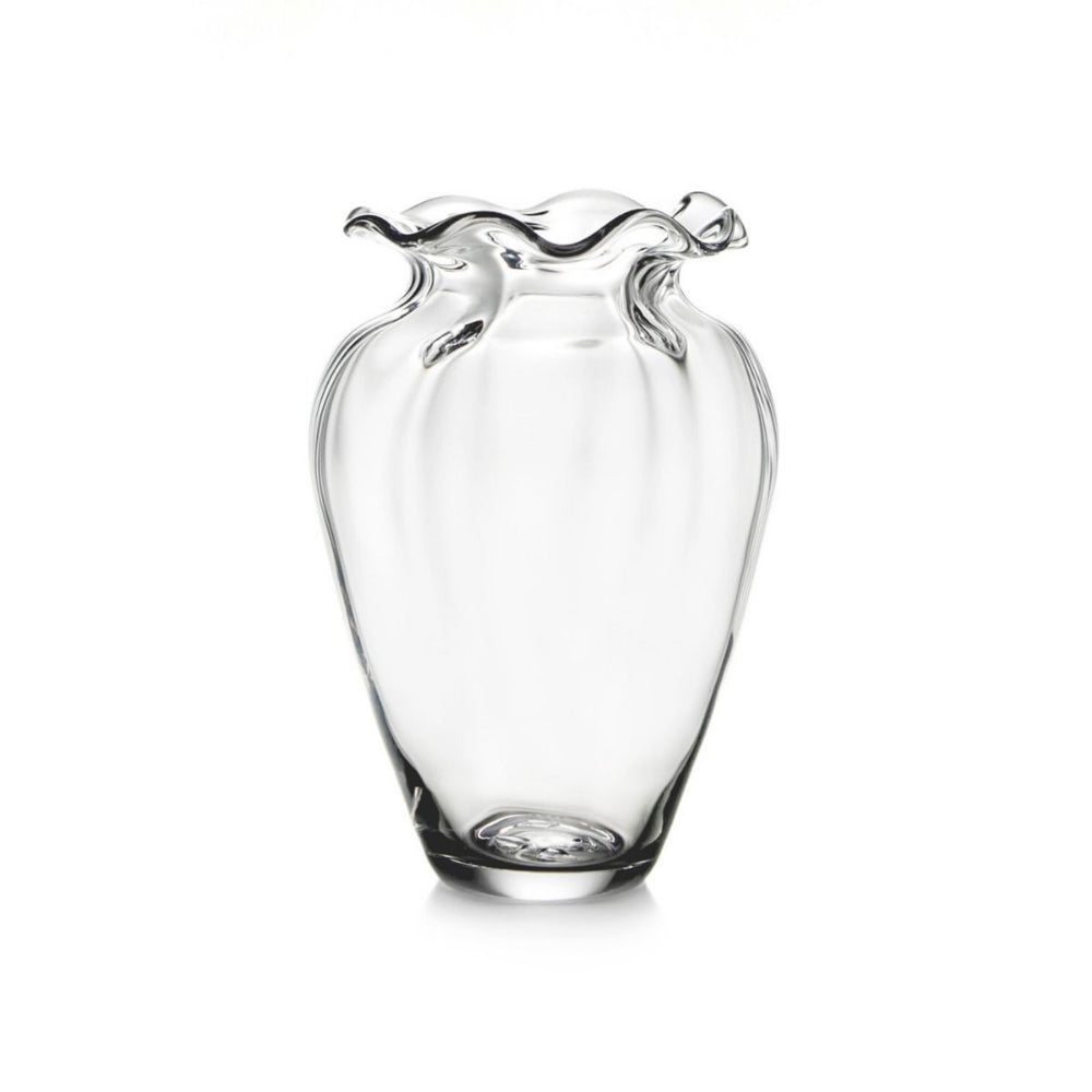 Clear glass vase with wavy design on a white background